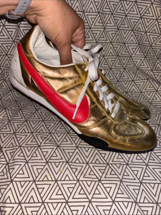 Nike Shoes - Nike Gold Leather Sneaker with Red Swoosh and White Laces